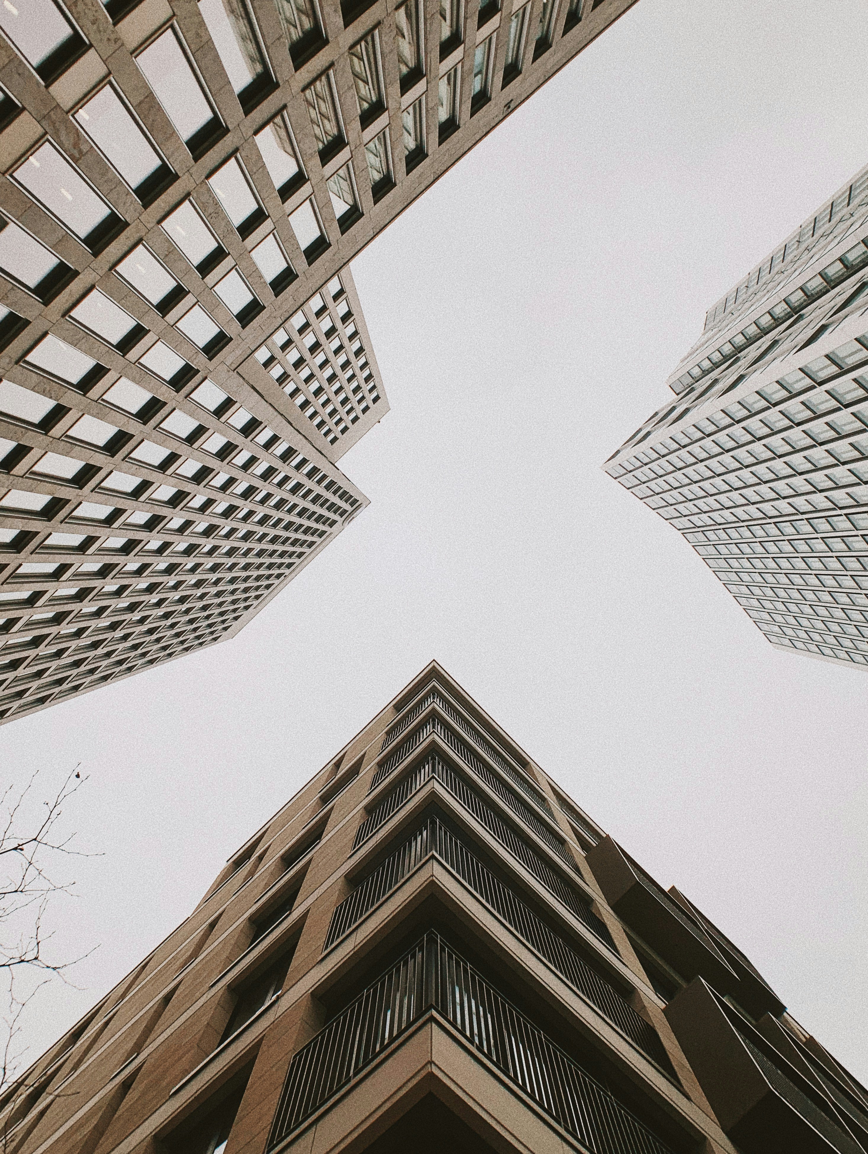 Looking up between three towers